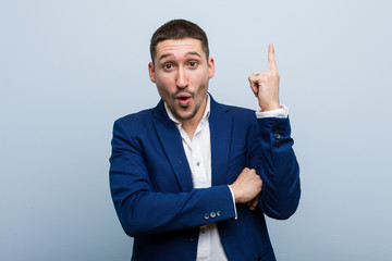 Young business caucasian man having some great idea, concept of creativity.