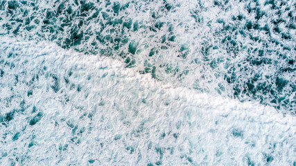 Surf on a remote beach. West Coast, South Island, New Zealand