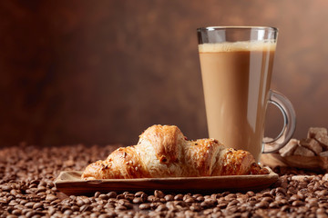 Coffee latte and croissant.