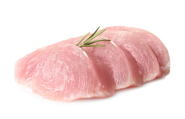 Cut raw turkey fillet with rosemary on white background