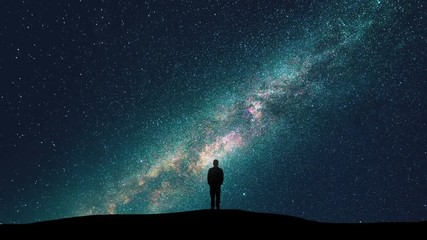 The male standing against the starry sky. time lapse