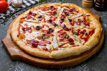 Pizza with meat and barbecue sauce
