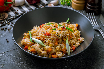 fried rice with chicken , egg and vegetables