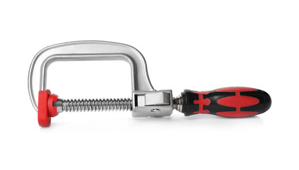 New clamp isolated on white. Construction tool