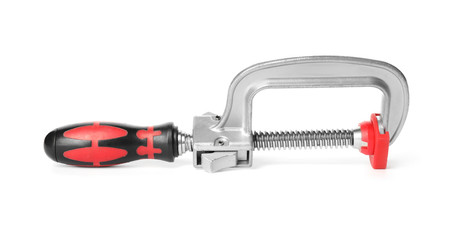New clamp isolated on white. Construction tool