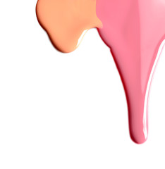 Different color nail polishes flowing on white background