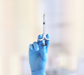 Beauty injections,syringe in hand.Concept of rejuvenation