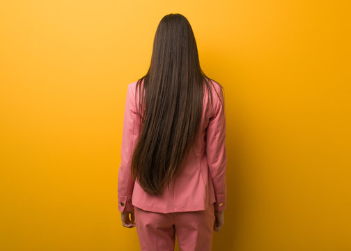 Young Modern Business Woman From Behind, Looking Back