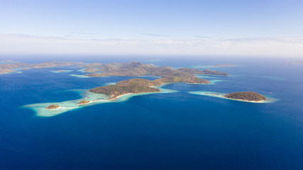 aerial seascape Lagoons with blue, azure water in middle of small islands. Palawan, Philippines....
