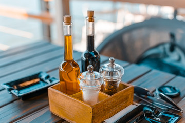 Olive oil and balsamic vinegar on a wooden background