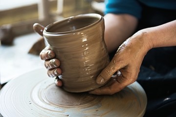 A lace maker and ceramicist create artwork