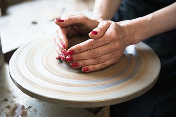 A lace maker and ceramicist create artwork