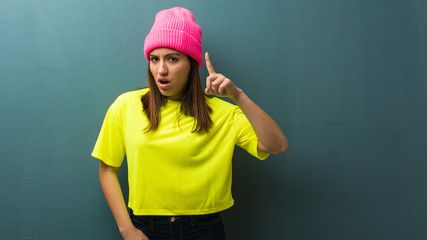 Young modern woman having an idea, inspiration concept