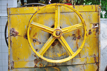 Close-up Rusty Yellow V-Belt Pulley of Construction Equipment