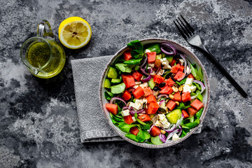 Lamb's lettuce with watermelon, feta, cucumber, red onion and nut