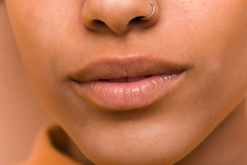 Fototapeta premium Closeup of a black woman mouth