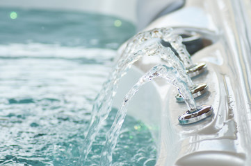 closeup of jet of water in swirl bath - 267639992