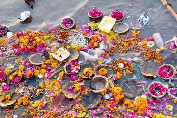 Peoples is kindling lamp with flowers in evening time varanasi, uttar pradesh, Varanasi, India