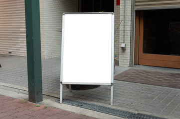 Large blank billboard on a street wall, banners with room to add your own text