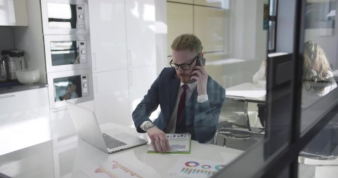 Male bank accountant working during break