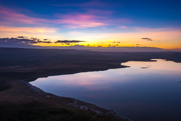 Fototapeta na wymiar Kenya. Africa. The Lake Nakuru. Sunset on lake Nakuru in Kenya. African colorful sunset. Africa nature landscapes.