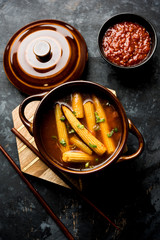 Baby Corn Manchurian with gravy - popular Indo-chinese recipe. selective focus