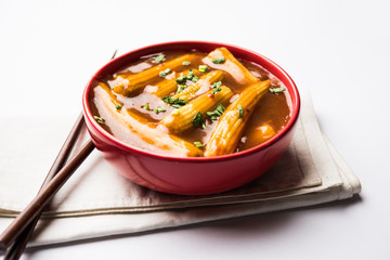 Baby Corn Manchurian with gravy - popular Indo-chinese recipe. selective focus