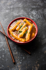 Baby Corn Manchurian with gravy - popular Indo-chinese recipe. selective focus