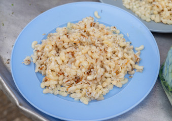 Ant eggs sell in street market.