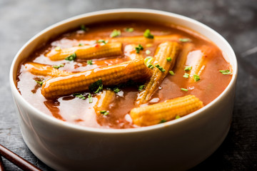 Baby Corn Manchurian with gravy - popular Indo-chinese recipe. selective focus