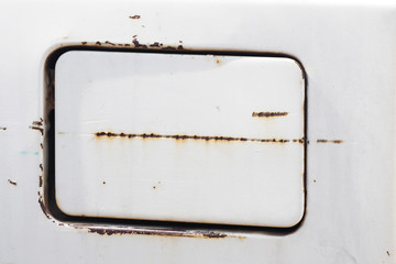 Background hatch gas tank old white car with scratches and rust...