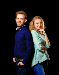 young sexy couple portrait photo on black background