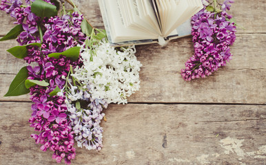 lilac flowers and book