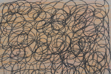 black scribbles on orange pastel background texture