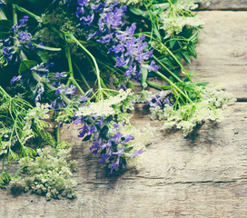 summer flowers on a wooden background