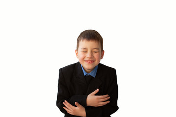 boy laughs, clasping himself with hands, isolate