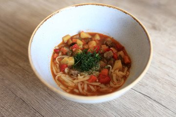 Bowl with Laghman soup