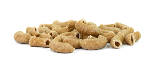 Rustic rigatoni pasta isolated on white background. Maccheroni integrals pasta. Wholemeal Pasta. Close-up on a Integral Penne.