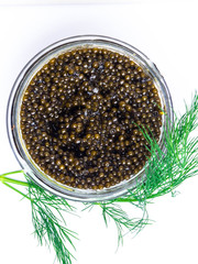 Fresh black caviar with dill for snacks and alcohol.