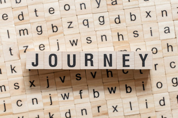 Journey word concept on cubes