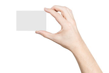 Hand holding a blank card or a ticket/flyer, isolated on white background