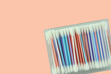 Isolated cotton bud in box. Colorfull Cotton swab used for cleaning ear.