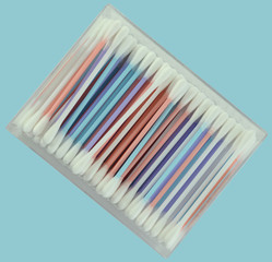 Isolated cotton bud in box. Colorfull Cotton swab used for cleaning ear.