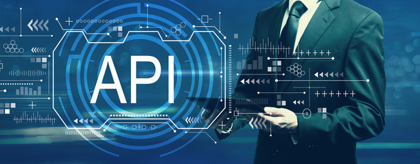 API concept with businessman holding a tablet computer