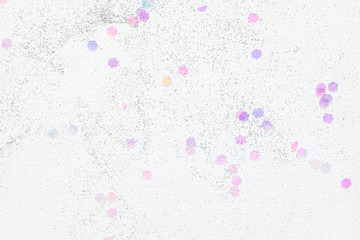 Confetti  on a white background, festive concept.  Perfect place for your design.