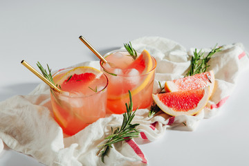 Homemade Cocktail making. Grapefruit and Rosemary cocktail.  Refreshing and non-alcoholic drink perfect for spring or summer.