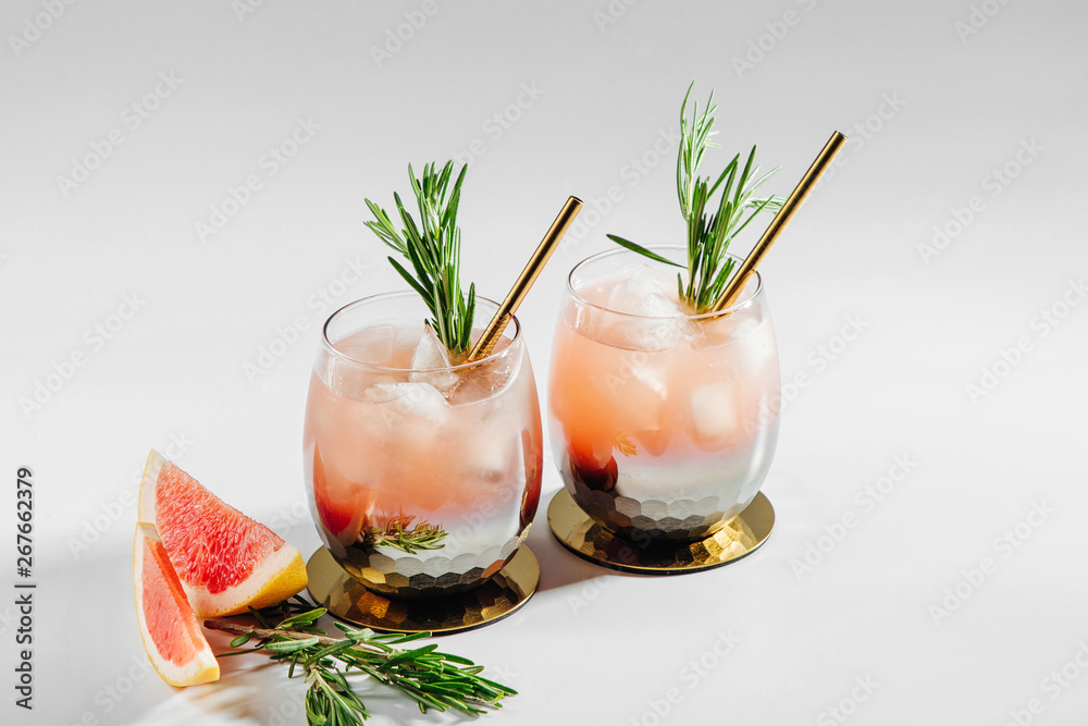 Wall mural grapefruit and rosemary cocktail. refreshing and non-alcoholic drink perfect for spring or summer.