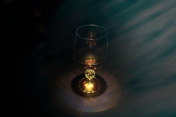 Glasses and candle on the table