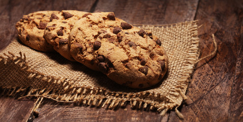 Chocolate cookies on wooden table. Chocolate chip cookies shot very delicious