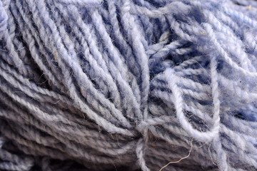 Color yarn for knitting, knitting wool balls . Beautiful yarn knitting background. Close up of multi colored kitting yarn.